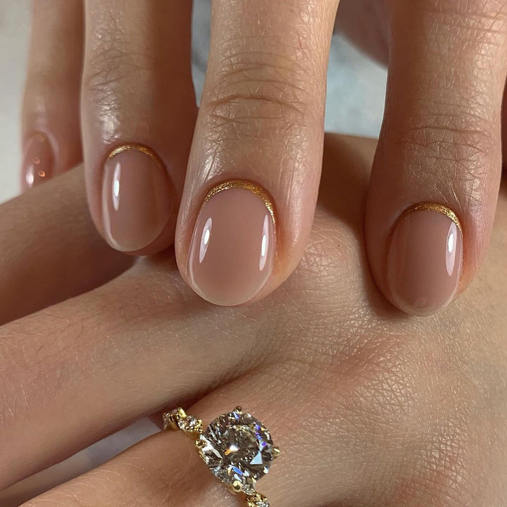 Elegant Nail Art in Modern French Tip Style Bowlift