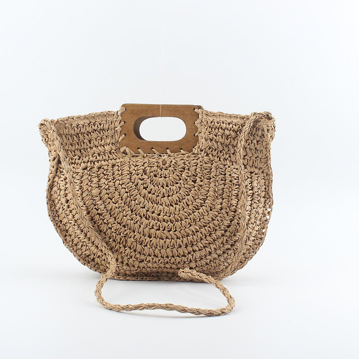 Handbag made of hand-woven natural material with stylish wooden handle Bowlift