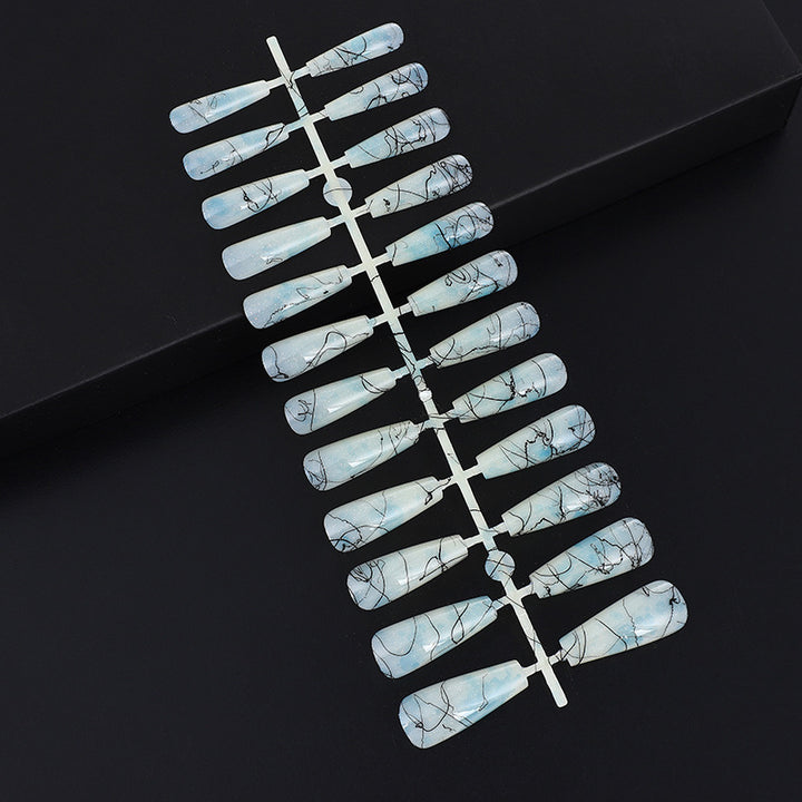 Creative nail art with blood splatter design Bowlift