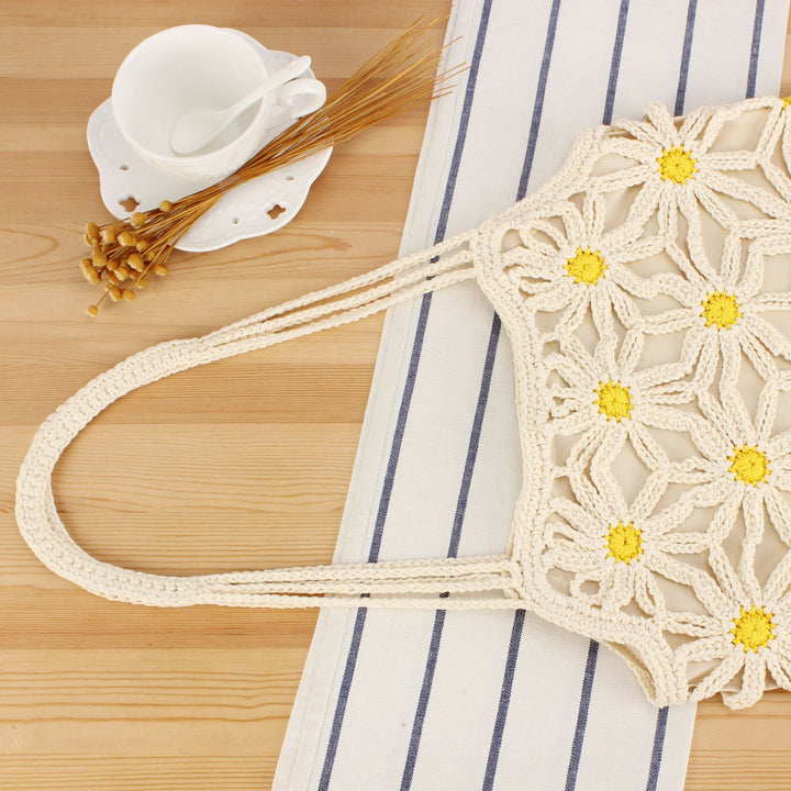 Handcrafted macrame bag with floral accents Bowlift