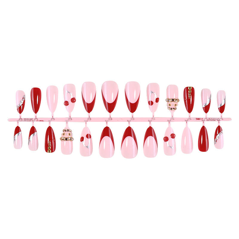 Artificial nail set with glamorous accents and cheerful patterns Bowlift