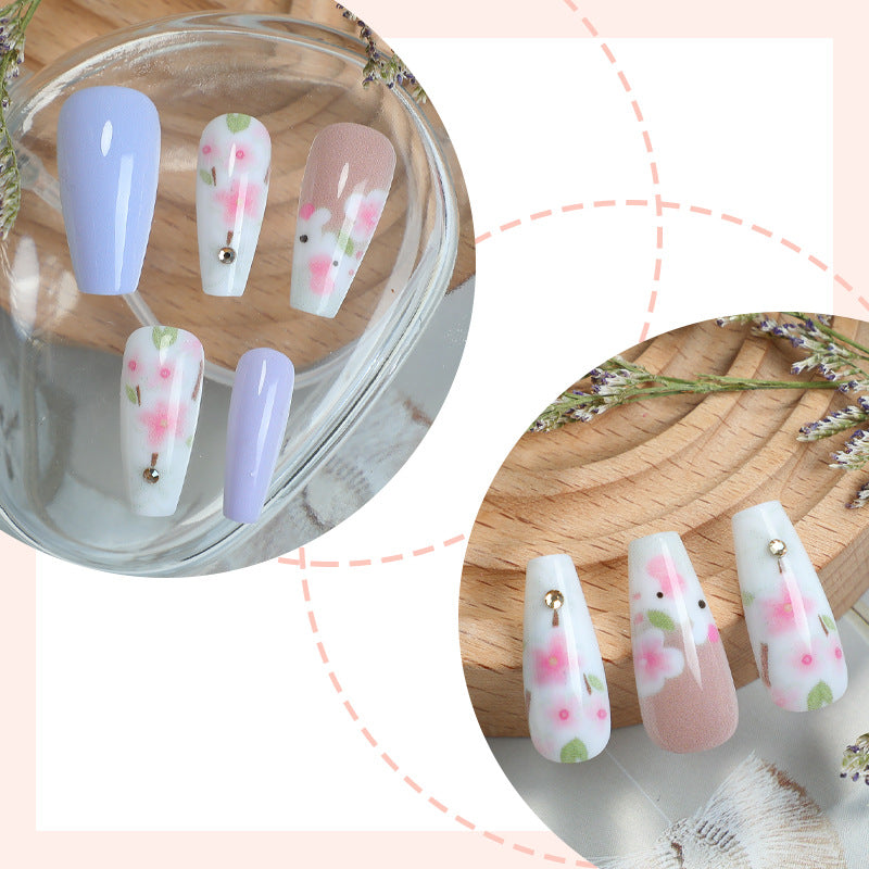 Elegant Press-On Nail Set with Floral Accents Bowlift 1788496046
