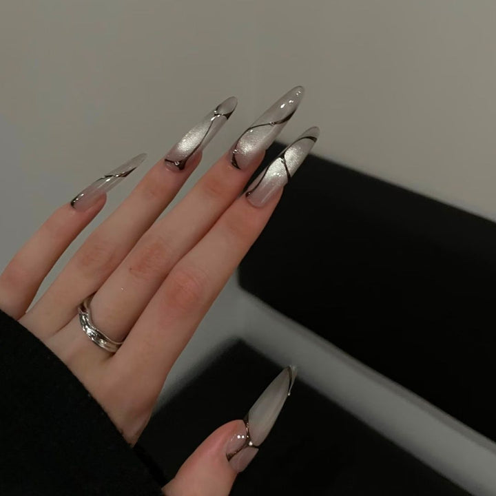 Artistic Long Stiletto Nail Enhancements Bowlift