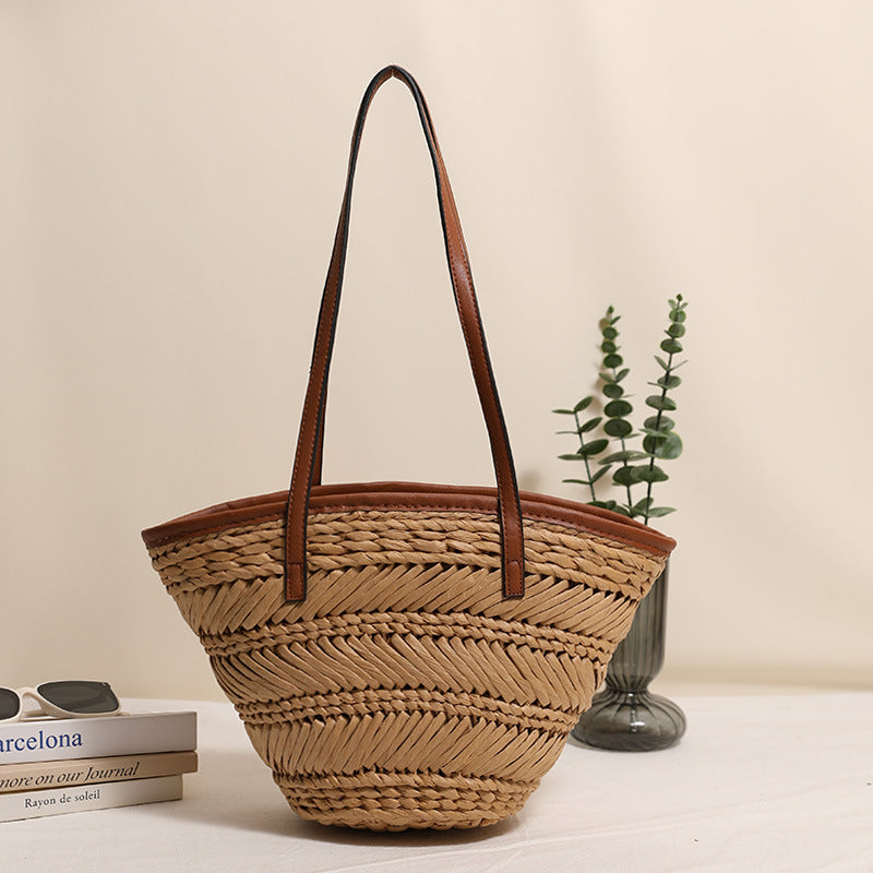 Braided basket bag with innovative leather handles Bowlift