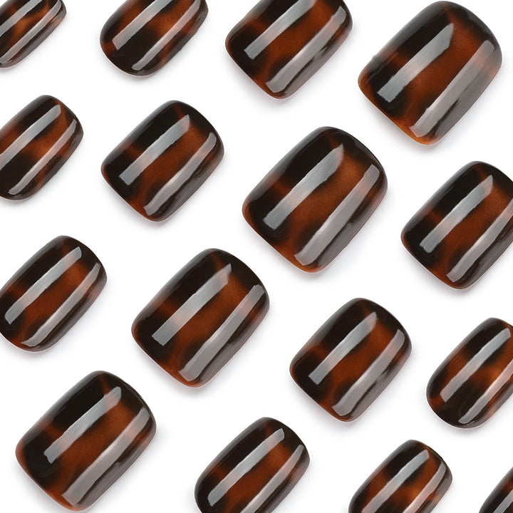Artificial nail extensions with elegant tortoiseshell decor Bowlift