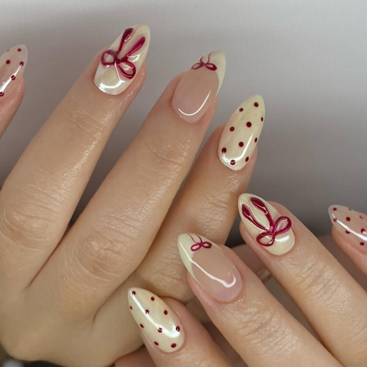 Artful acrylic nails with elegant floral accents Bowlift