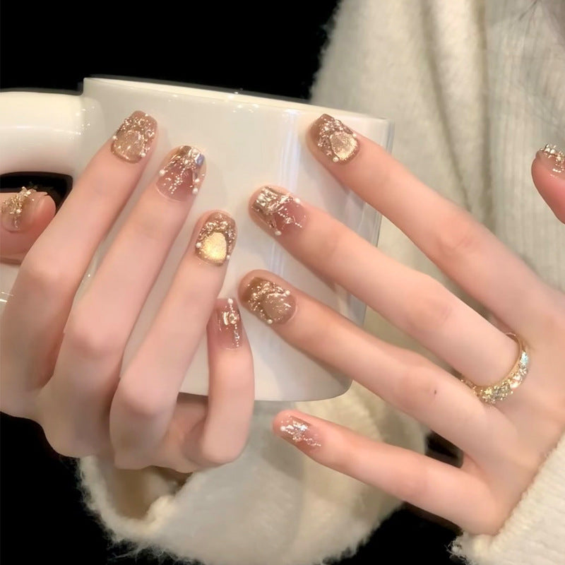 Glossy Nail Art Set with Sparkling Glitter Accents Bowlift