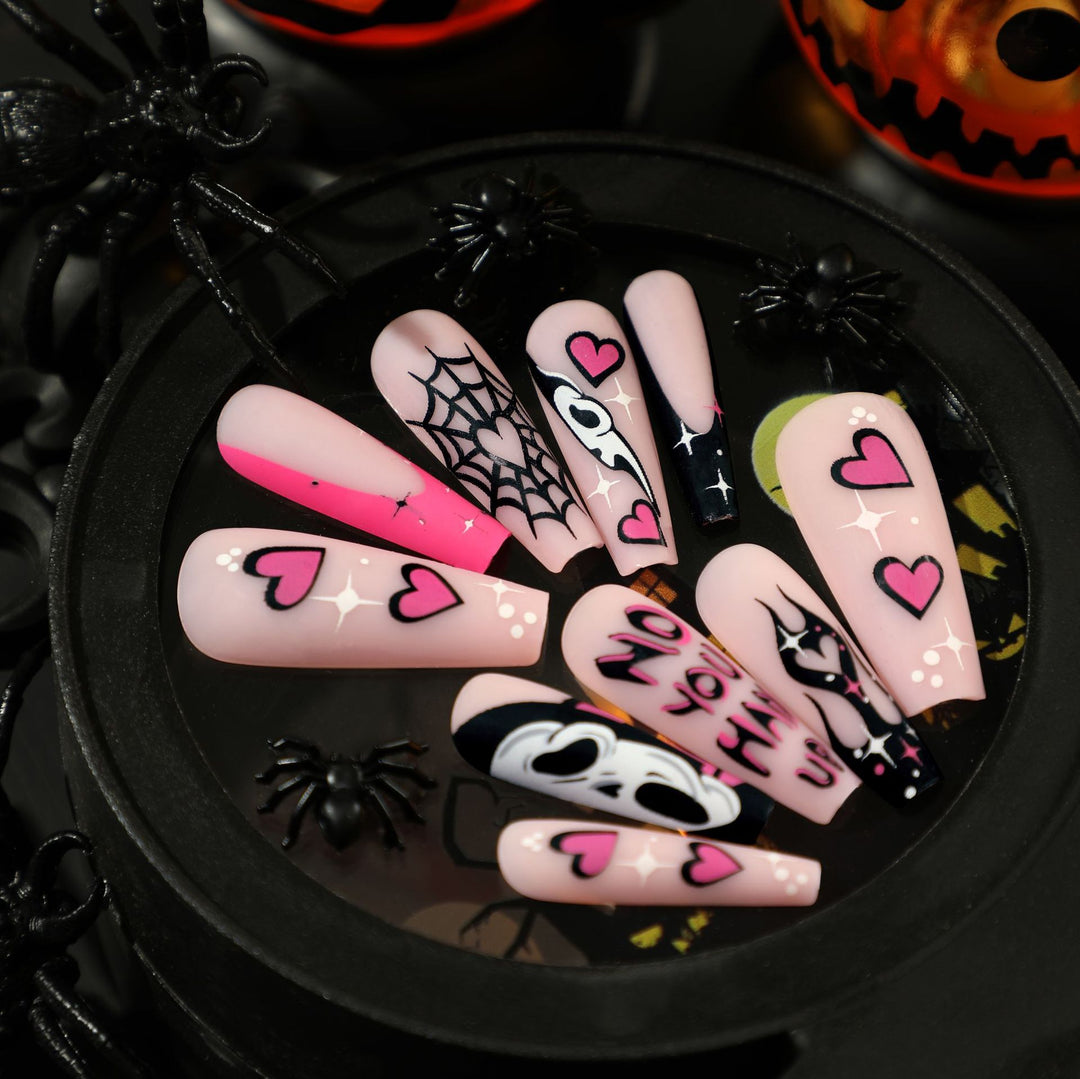 Artificial nail art with Halloween motif and unique embellishments Bowlift