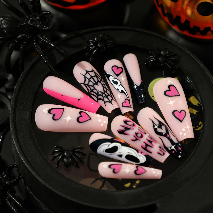 Artificial nail art with Halloween motif and unique embellishments Bowlift