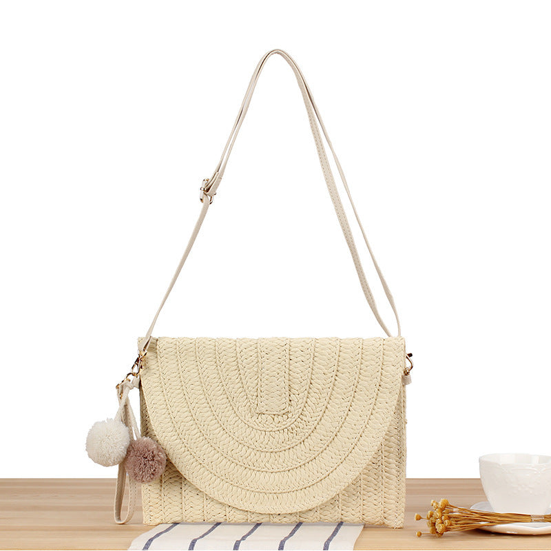 Shoulder bag made of braided natural material with original wave pattern Bowlift