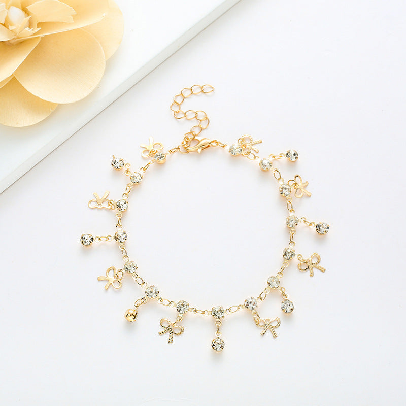 Crystal Bow Charm Bracelet Bowlift