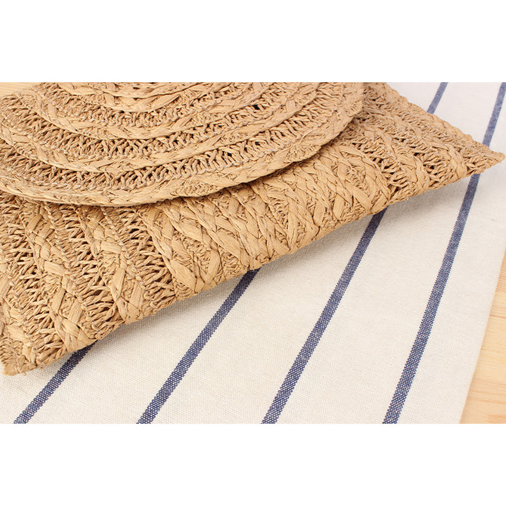 Shoulder bag made of high-quality woven natural material with elegant wave pattern Bowlift