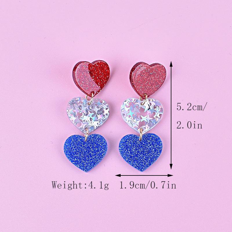 Women's long star pendant earrings made of glitter resin with three-tier chain suspension and fishhook bowlift