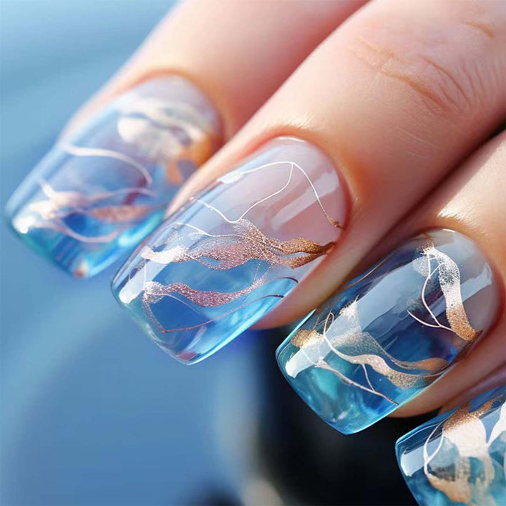 Creative nail decoration with gold accents Bowlift