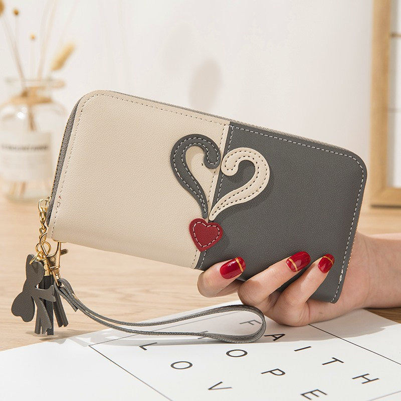 Stylish wallet with heart appliqués Bowlift