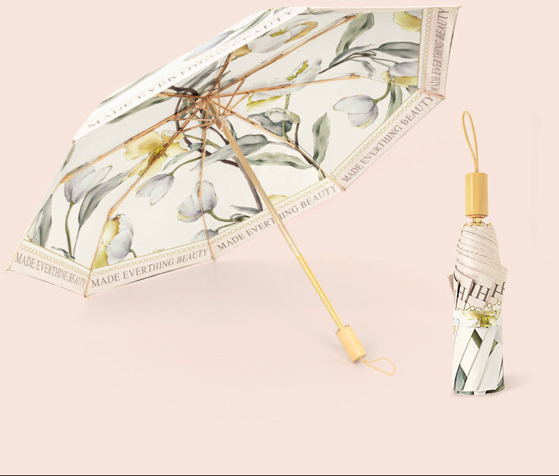 Ladies folding umbrella with floral patterns Bowlift