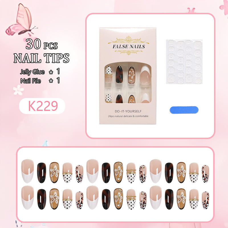 Exquisite nail art with elegant embellishments Bowlift