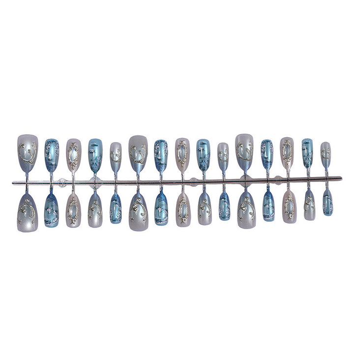 Nail art set with luxurious patterns and elegant embellishments Bowlift