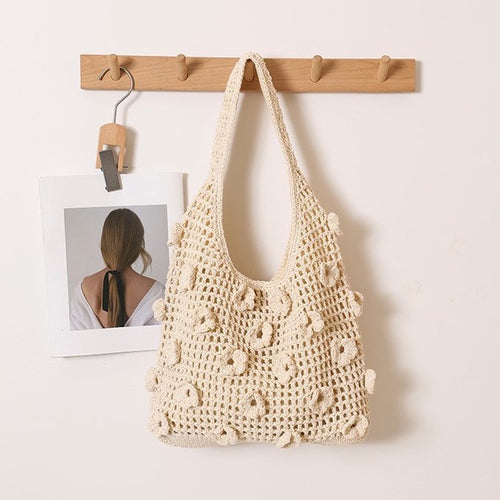 Hand-knotted shoulder bag with floral structural elements Bowlift