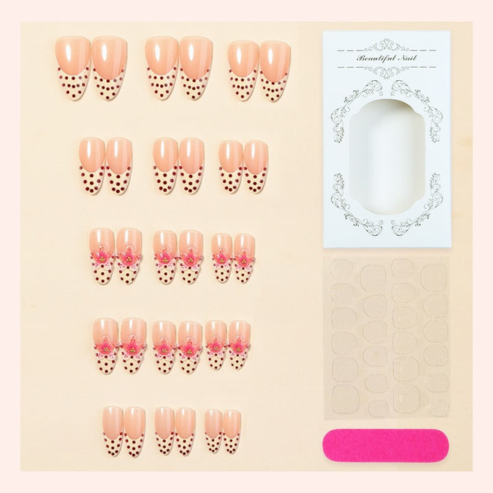 Acrylic nail set with romantic dots and floral accents Bowlift