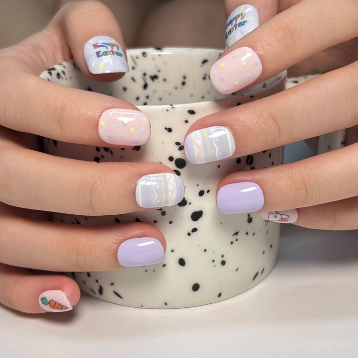 Artful nail art with cute animal motifs and pastel-colored design Bowlift