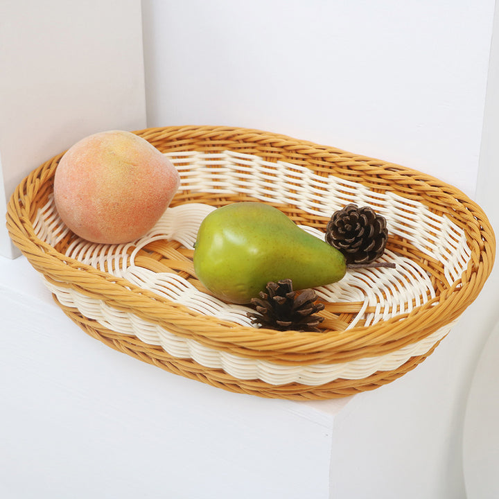 Handcrafted fruit basket made of woven material Bowlift
