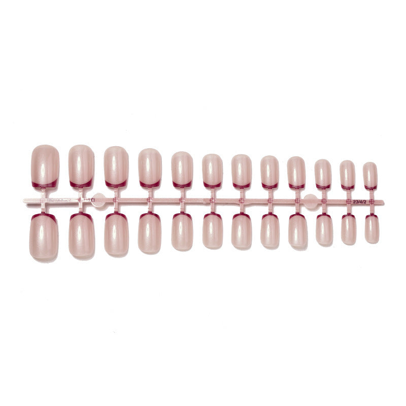 Artificial nail set with glamorous French tip design Bowlift