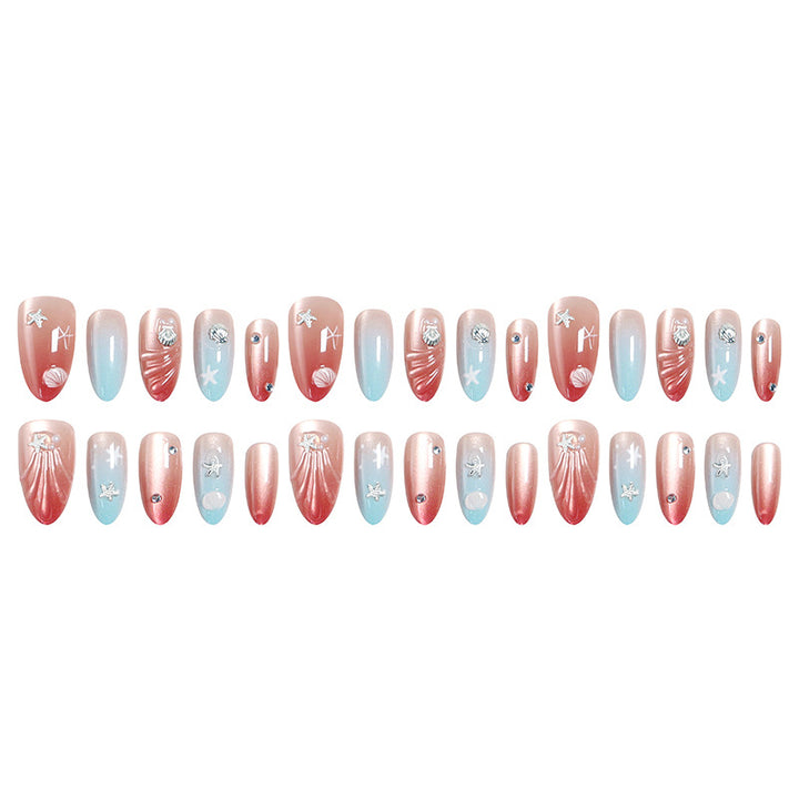 Artificial nails with sparkling rhinestone embellishments and maritime design Bowlift