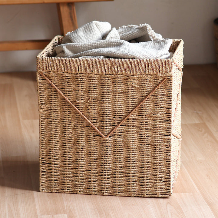 Storage basket made of braided rattan Bowlift