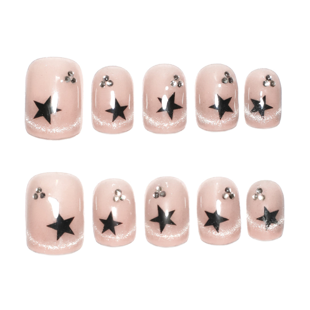 Artistic acrylic nails with glamorous star motifs Bowlift
