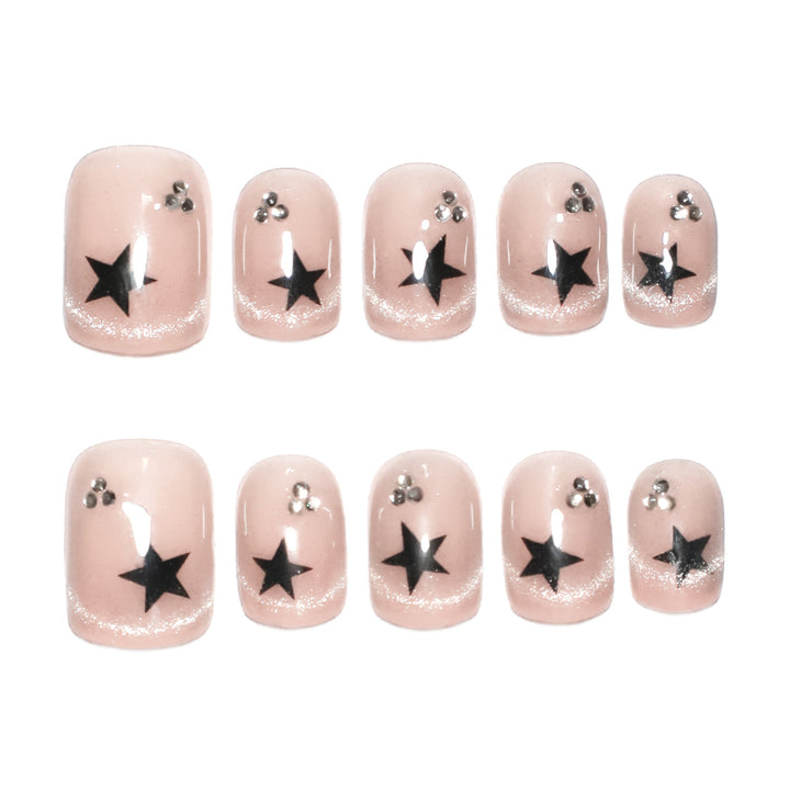 Artistic acrylic nails with glamorous star motifs Bowlift