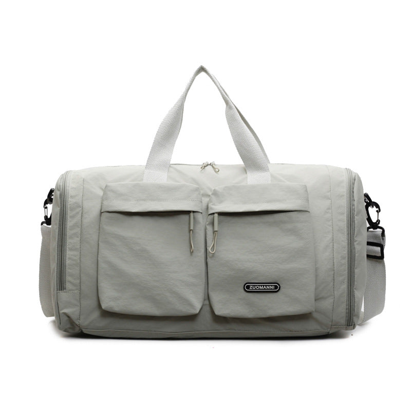 Sporty Travel Bag With Several Exterior Pockets Bowlift