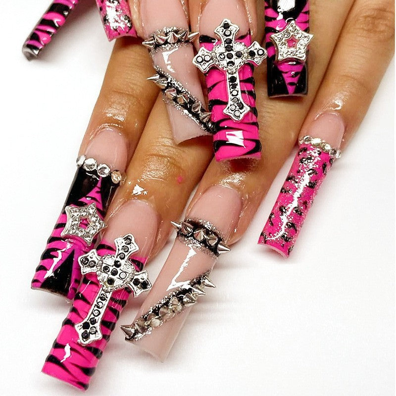 Glamorous artificial nail set with sparkling rhinestones and cross decorations Bowlift