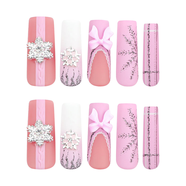 Artful nail extensions with festive decorations Bowlift