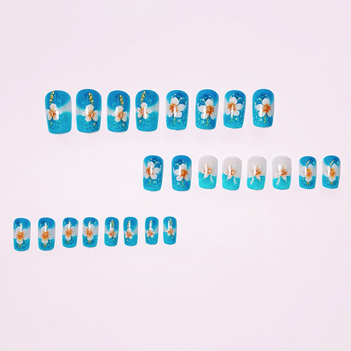Artificial nails with floral accents and glitter patterns Bowlift
