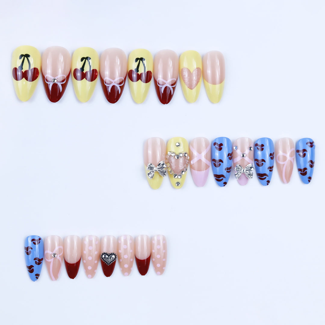 Artificial nails with playful design and 3D embellishments Bowlift