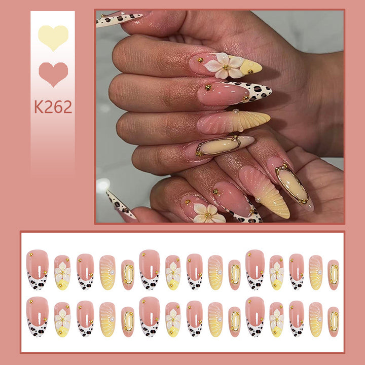 Artificial nails with floral patterns and golden accents Bowlift