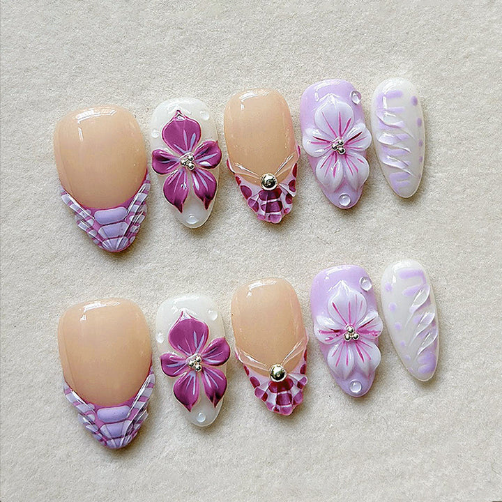 Artificial nail set with elegant flower designs and glitter accents Bowlift