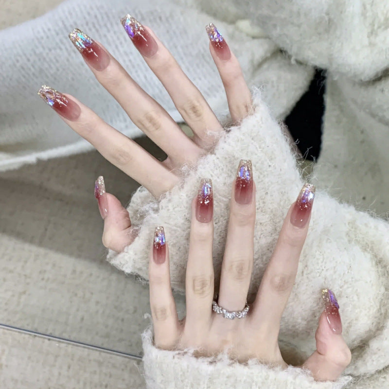 Glamorous artificial nails with glitter effects Bowlift