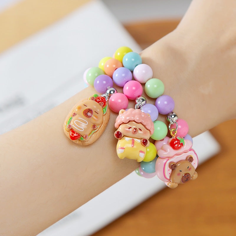 Colorful children's bracelet with crafted pendant Bowlift