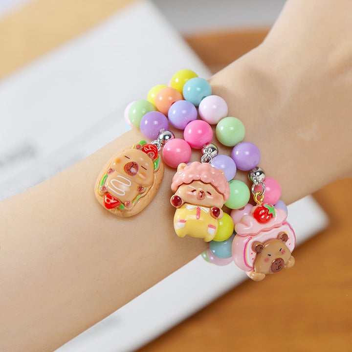 Colorful children's bracelet with crafted pendant Bowlift