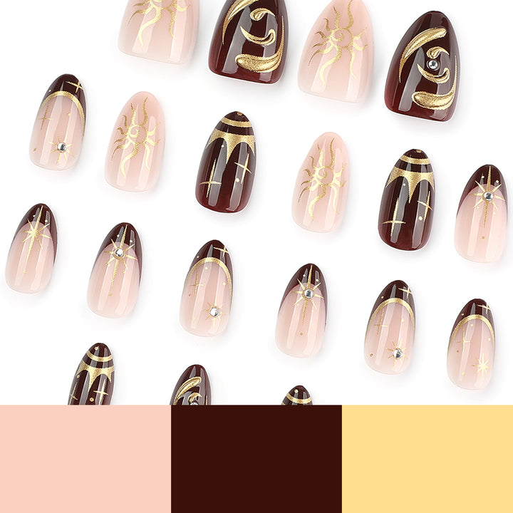Artful nail art with golden accents and mystical motifs Bowlift