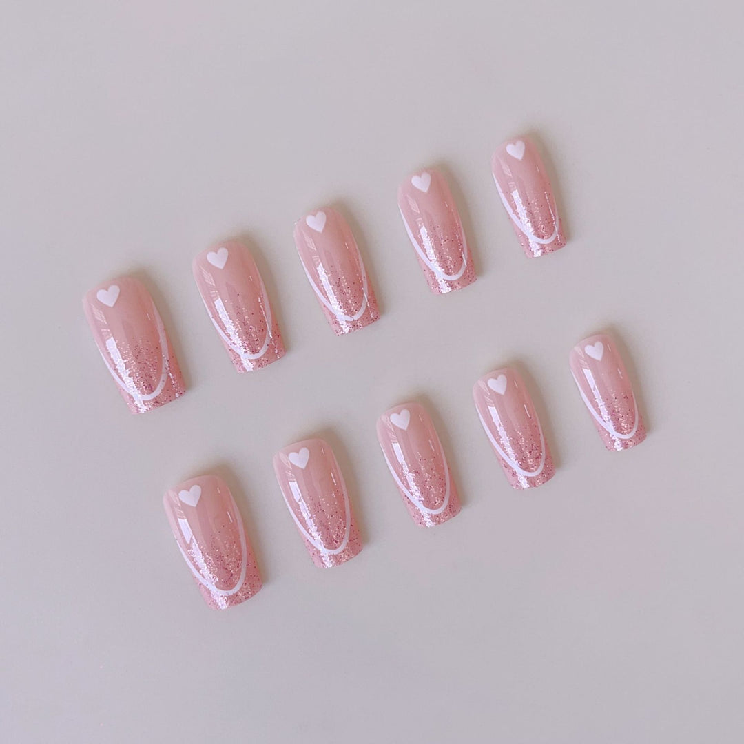 Nail art set with romantic heart designs and glamorous accents Bowlift