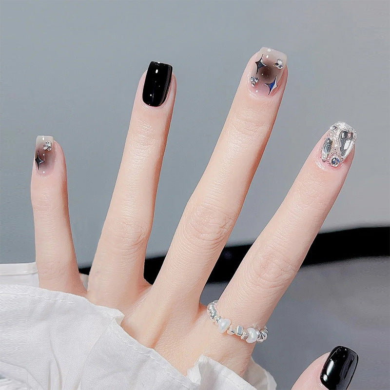 Artificial nail set with glamorous glitter and crystal decorations Bowlift