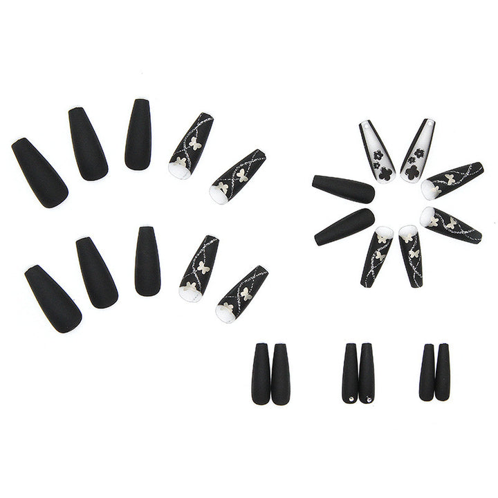 Art nail set with elegant butterfly and flower motifs Bowlift