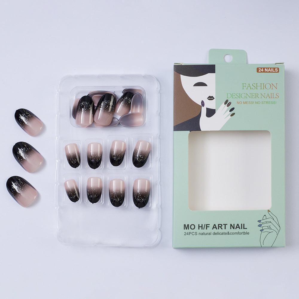 Elegant artificial nails in modern ombre style with glitter accents Bowlift