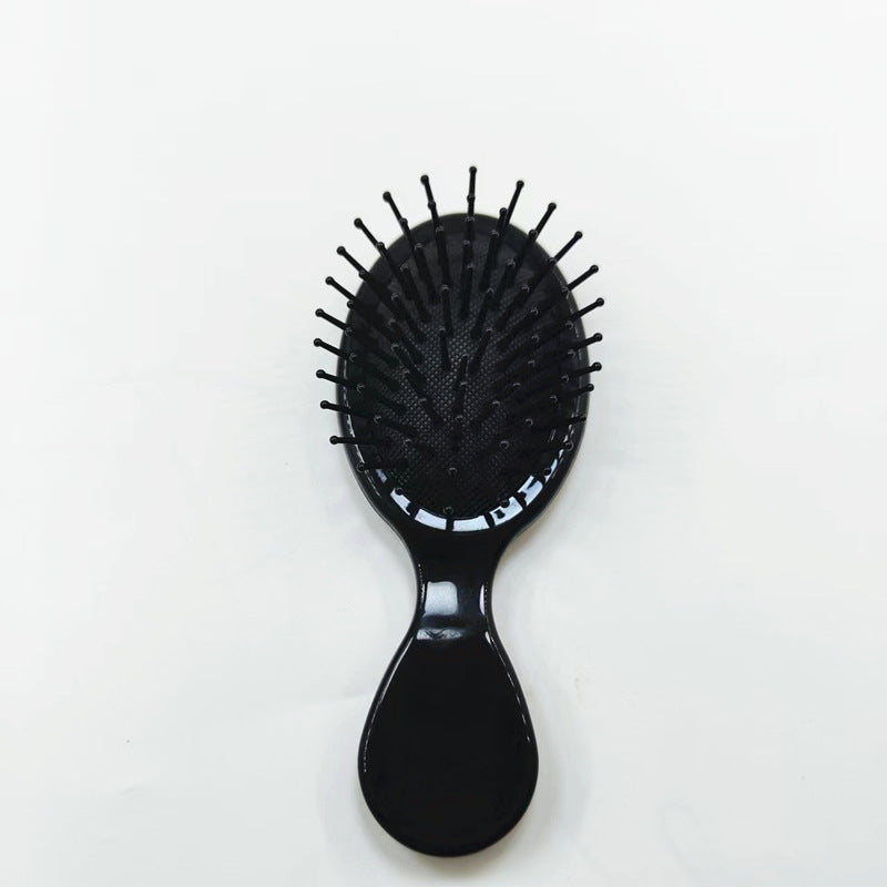 Hair comb with ergonomic handle Bowlift