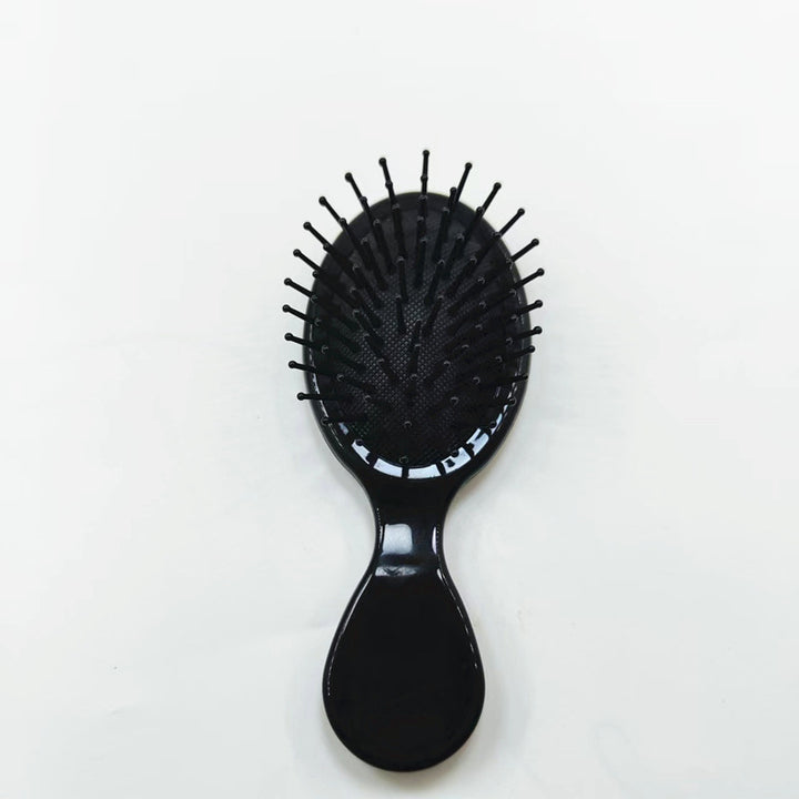 Hair comb with ergonomic handle Bowlift