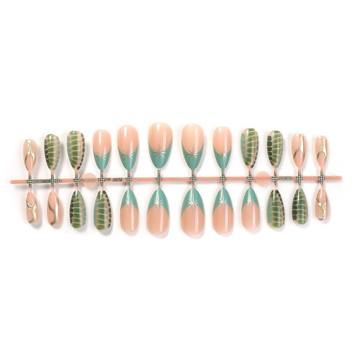 Artificial nail set with creative leaf design and elegant glitter accents Bowlift