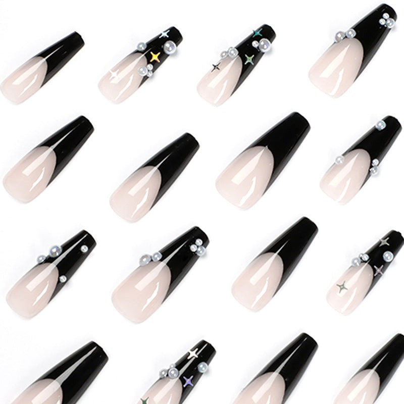 Artificial nail art with pearl and shine elements Bowlift